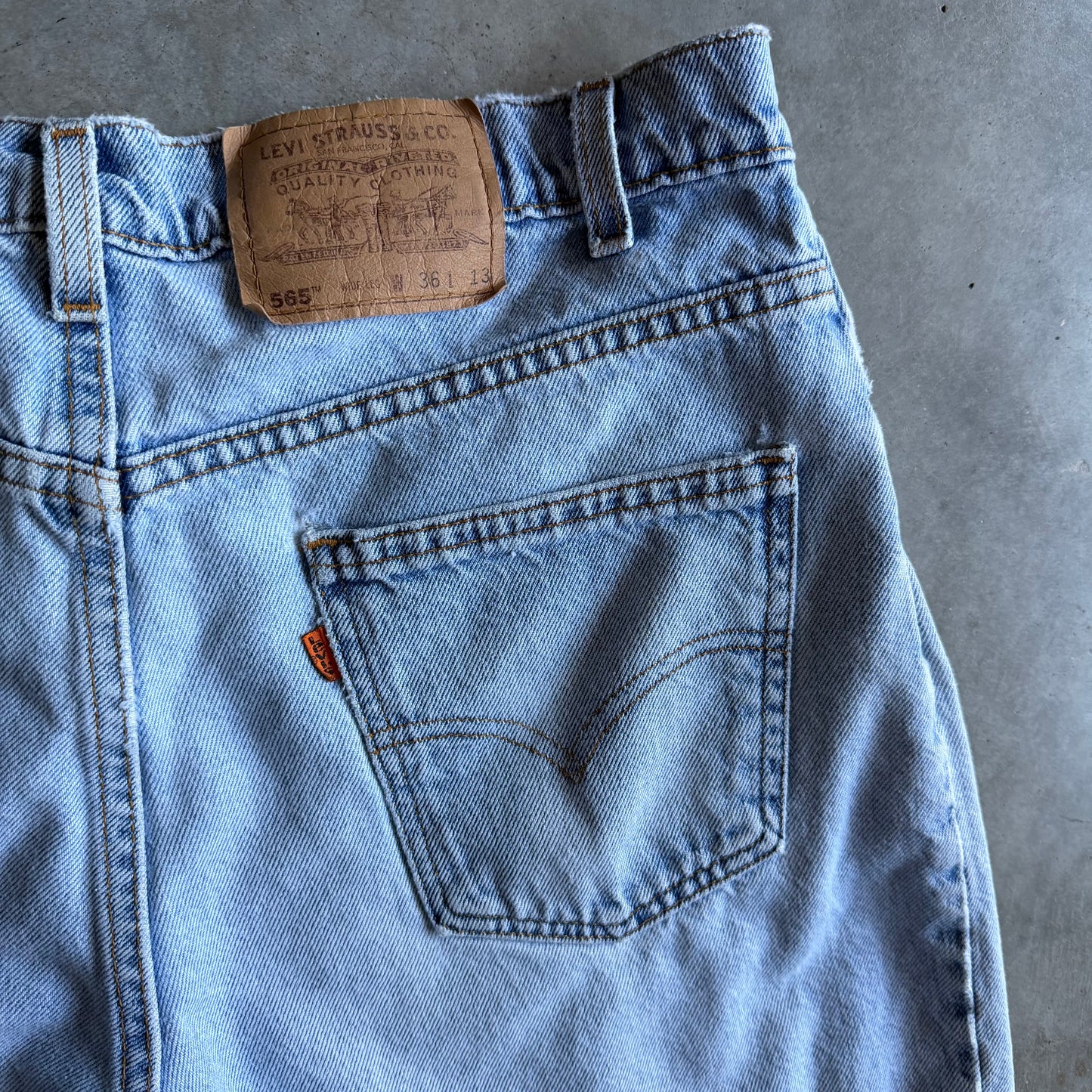 Vintage Levi’s 565 Orange Tab Distressed Blue Jorts
