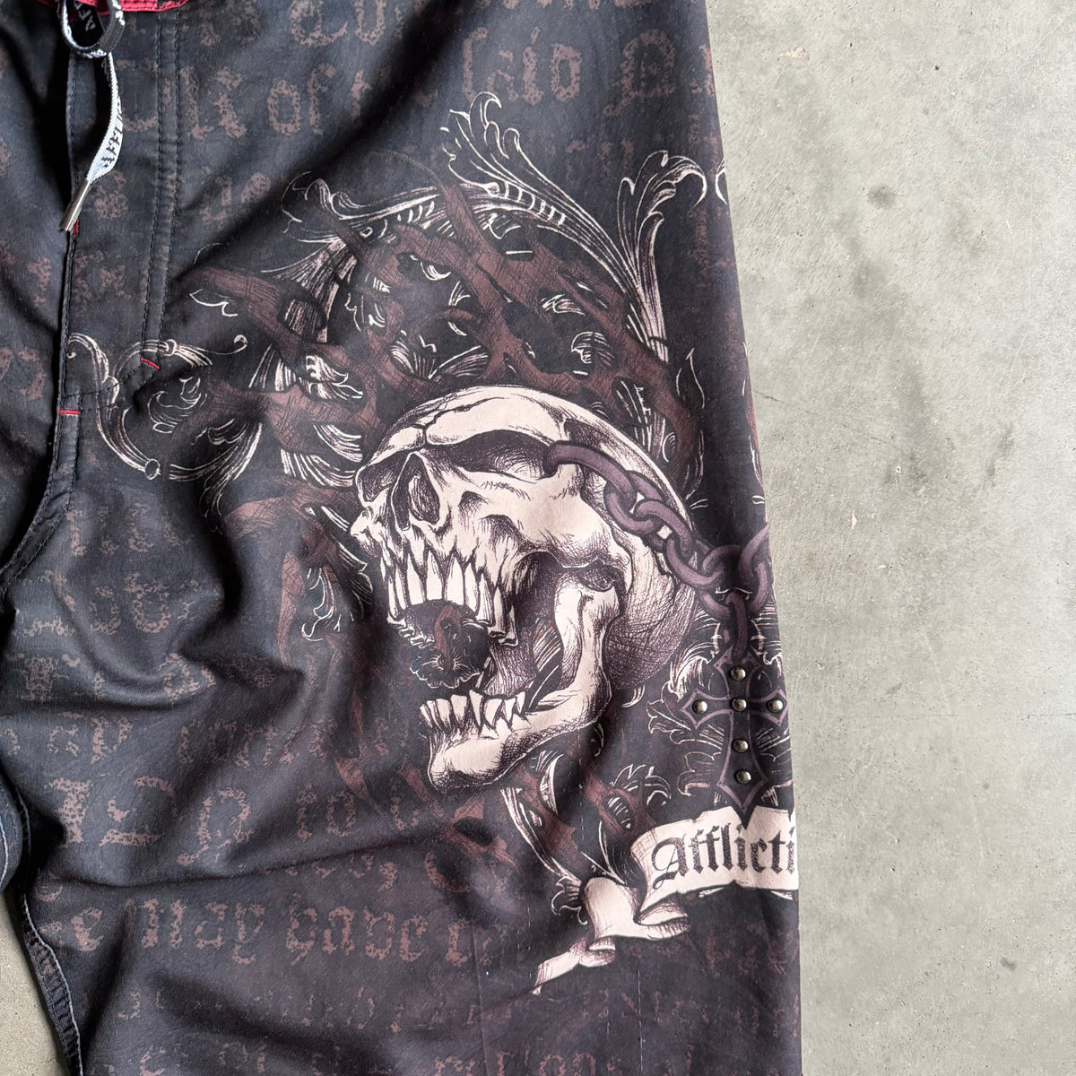 Y2K Affliction Black/Red Skull Graphic Board Shorts