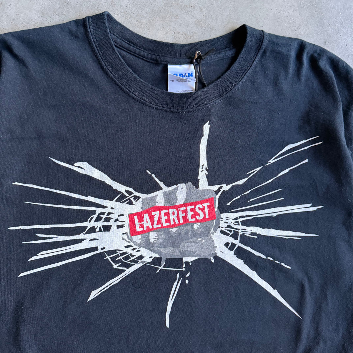 Y2K Lazerfest Fist Through Glass Promo Tee
