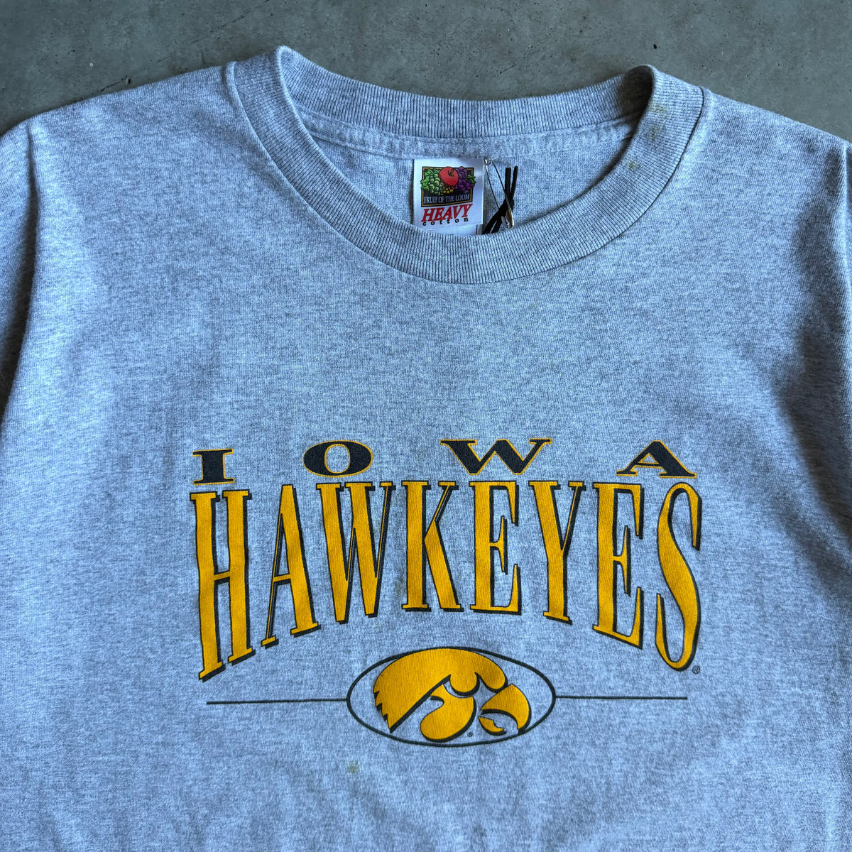 Y2K Iowa Hawkeyes Black & Gold Spell-Out Tee