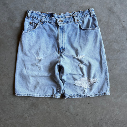 Vintage Levi’s 565 Orange Tab Distressed Blue Jorts
