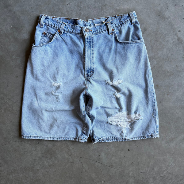 Vintage Levi’s 565 Orange Tab Distressed Blue Jorts