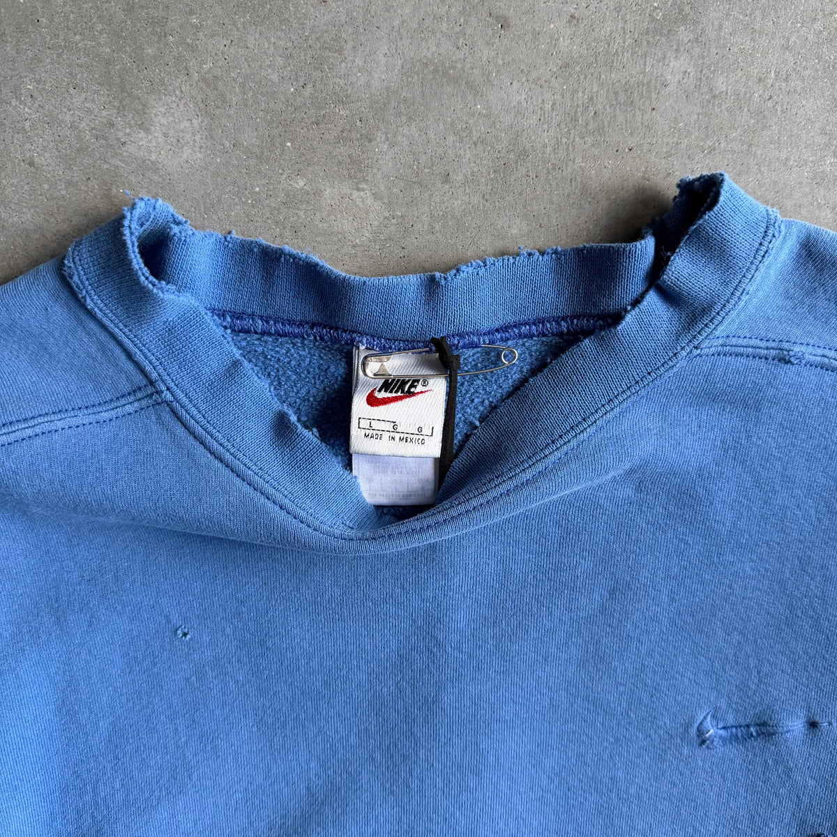 Vintage 90s Nike Baby Blue Distressed Thrashed Mini Swoosh Crewneck