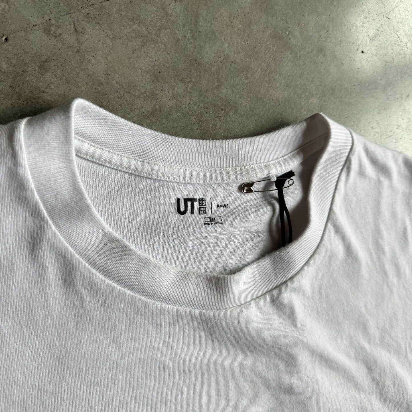 Kaws Uniqlo World In Your Hands Tee