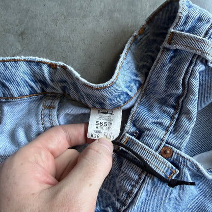 Vintage Levi’s 565 Orange Tab Distressed Blue Jorts