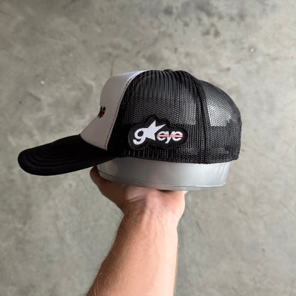Goldeneye Spell-Out Logo Side Patch Trucker Hat