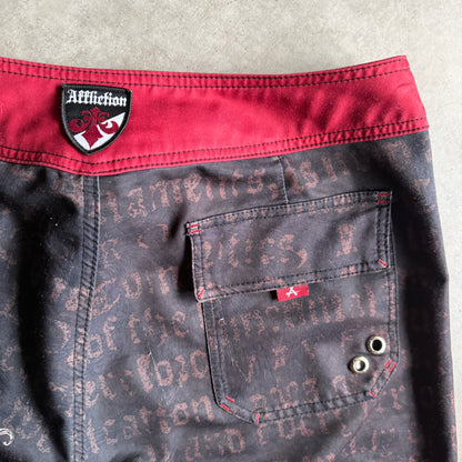 Y2K Affliction Black/Red Skull Graphic Board Shorts