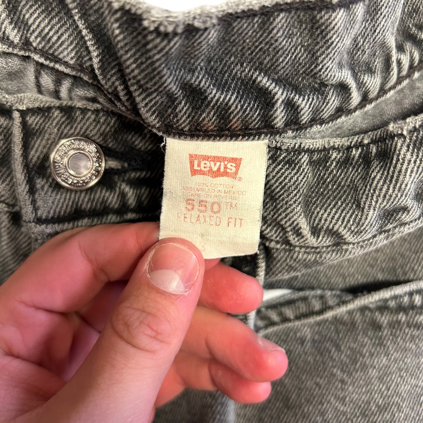 Vintage Levi’s 550 Faded Black Denim Shorts