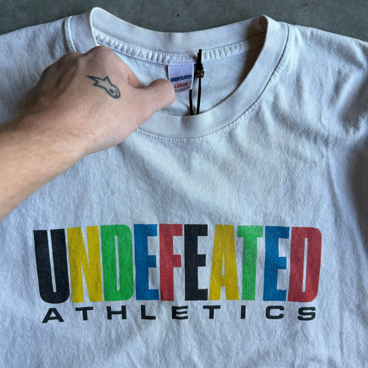 Undefeated Athletics Multi-Color Spell-Out Tee